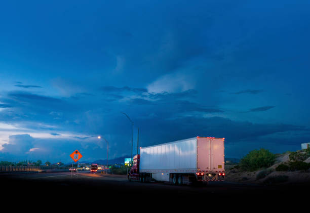 istock Semi-truck merging into the highway- panning motion blur 1430236025