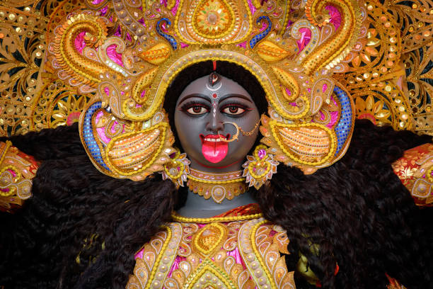 Goddess Kali idol decorated at Puja pandal, Kali puja also known as Shyama Puja or Mahanisha Puja, is a festival dedicated to the Hindu goddess Kali, celebrated on the new moon day in West Bengal. stock photo
