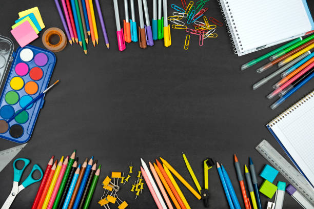istock School supplies on black background 1430243565
