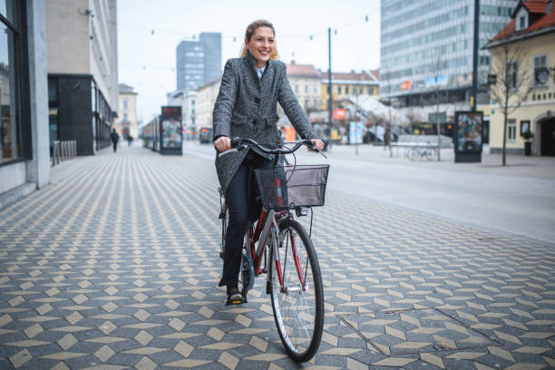 istock Young Female Executive On The Bicycle 1430253785