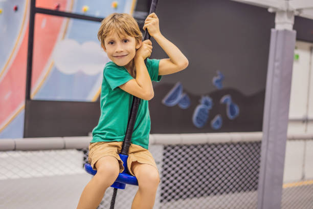 istock The boy has fun in an indoor playground 1430262434