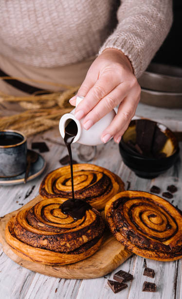 istock sweet chocolate cinnamon rolls on wood 1430262608
