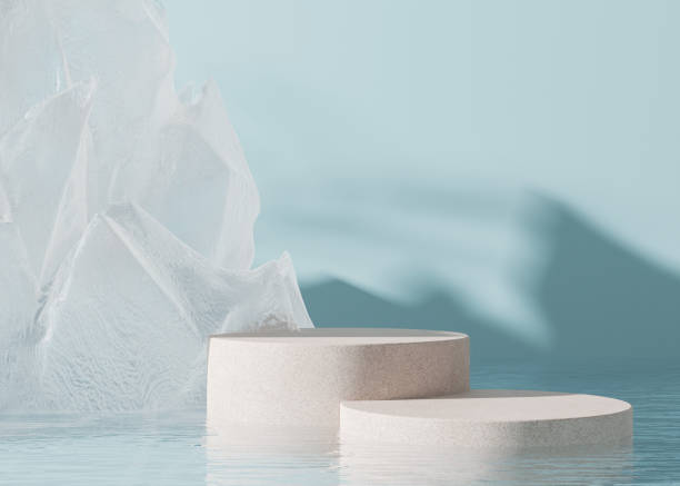istock Two podiums standing in water, with abstract ice or crystal form on blue background. Mock up for product, cosmetic presentation. Pedestal or platform for beauty products. Empty scene, stage. 3D render 1430266814