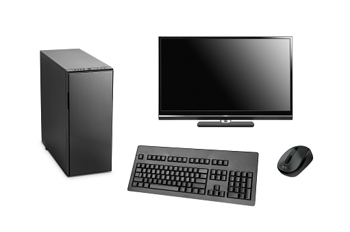 black computer with case, keyboard and mouse isolated on white background