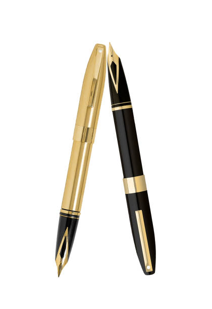 istock Gold Pens isolated on white 1430279533