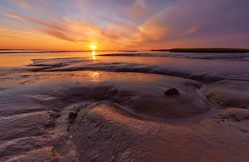 Tidal flats in the Wadden Sea during sunset