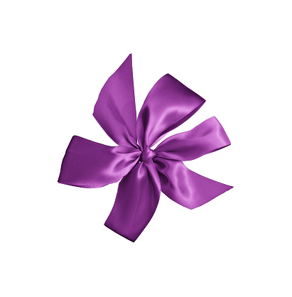 purple gift ribbon with bow isolated on white background