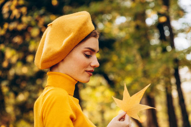 istock Beautiful woman enjoying autumn 1430288899