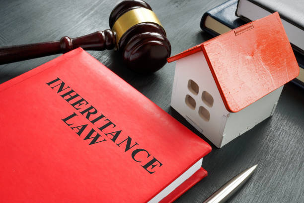 istock Inheritance law book, model of house and gavel. 1430289928