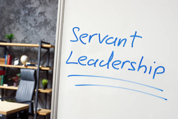 istock Servant leadership written on the whiteboard in the office. 1430289954
