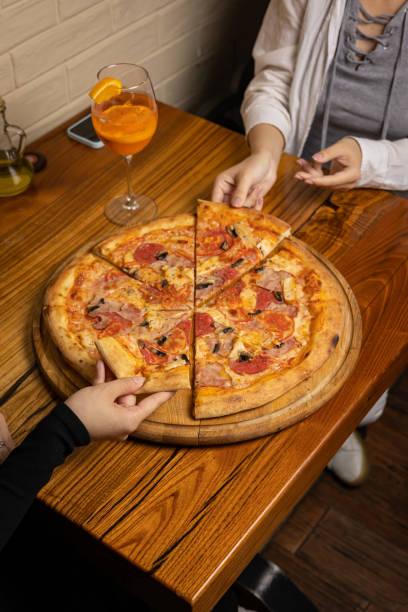 istock delicious pizza with cheese, greens, sauce 1430290984