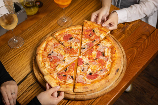 istock delicious pizza with cheese, greens, sauce 1430291024