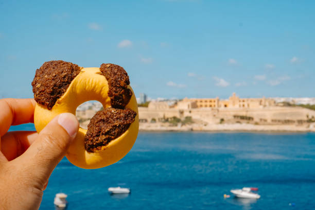 istock man with a qaghaq tal-ghasel typical of Malta 1430292309