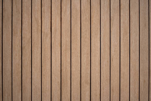 Arranged pattern  brown wooden planks board background makes you feel warm and natural.