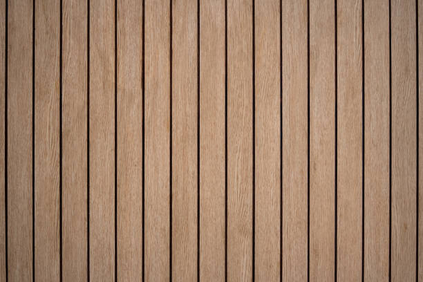 padrão arranjado de pranchas de madeira marrom fundo de prancha faz você se sentir quente e natural. - teak wood - fotografias e filmes do acervo