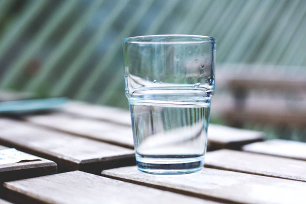 istock Glass of water on the table 1430300061