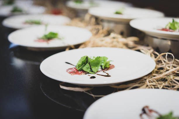 istock Fish dishes. Salad with salmon in buffet 1430301379