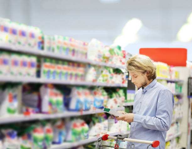 istock shopping in supermarket.(washing powder,detergent,shampoo, soap) 1430302505
