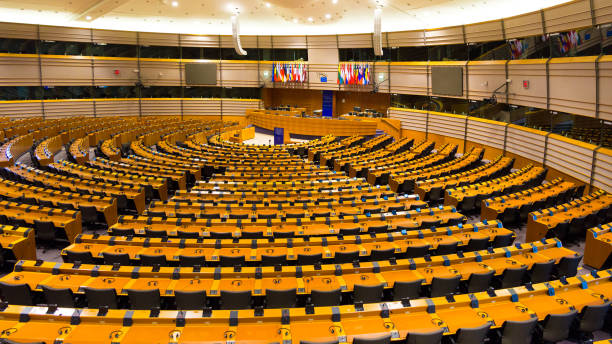 EU European Parliament EU European Parliament Room in Brussels. Belgium - July 30, 2014 european parliament stock pictures, royalty-free photos & images