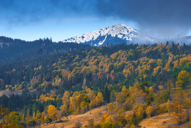 istock Snow-capped mountain peaks on a skyline 1430318406