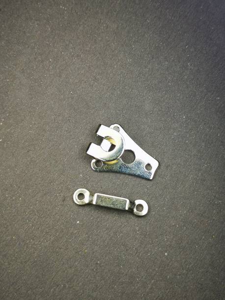 istock Silver hook and bar fastener closure isolated on black background 1430319229