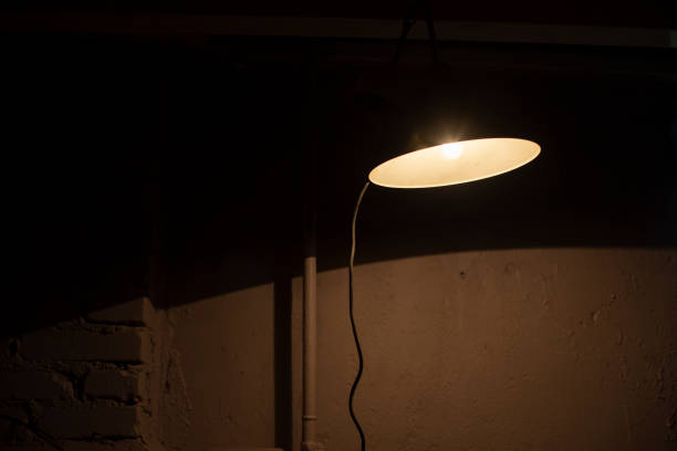 istock Lamp in room. Dim light indoors. Utility room. 1430322156