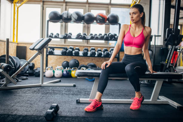 istock Beautiful woman in gym 1430327064