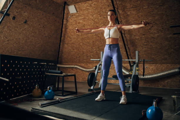 istock Fit woman exercising in gym 1430329013