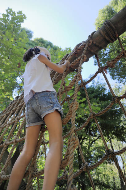 istock Japanese student girl playing with rope walking (7 years old) 1430329459
