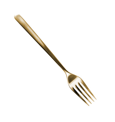 Golden fork isolated on a white background