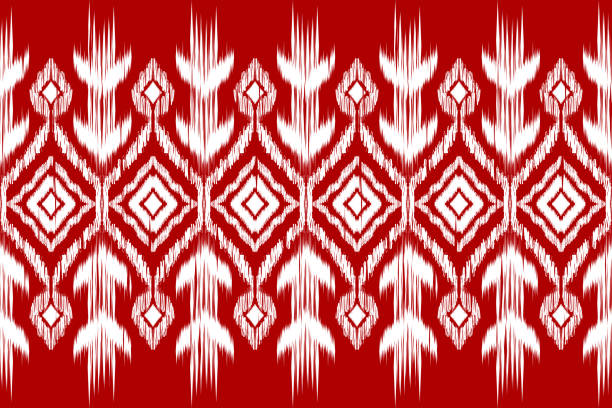 African Ikat paisley seamless pattern African Ikat paisley embroidery.red and white background.geometric ethnic oriental seamless pattern traditional.Aztec style abstract vector illustration.design for texture,fabric,clothing,wrapping, sarong stock illustrations