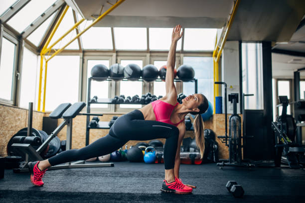 istock Fit woman exercising in gym 1430336929