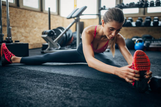 istock Fit woman exercising in gym 1430337069
