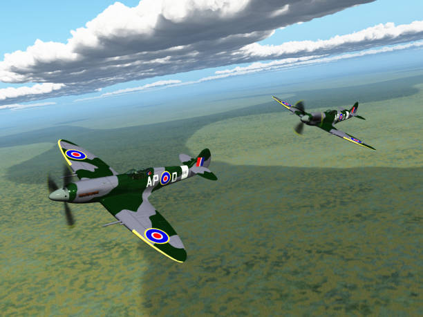 istock Two British fighter planes of World War II over a landscape 1430339532