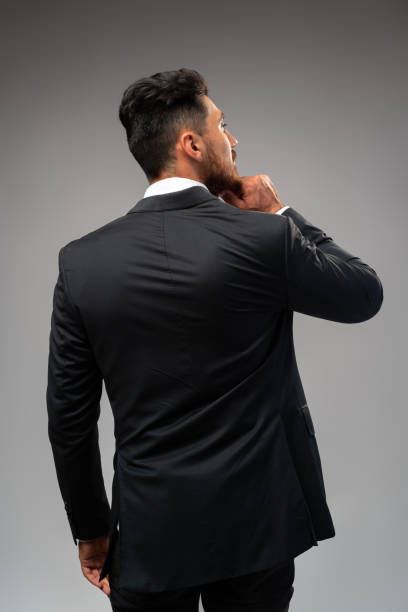 istock Studuo shot of thinking businessman standing over gray background 1430341199