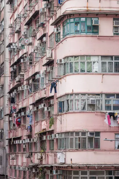 Close up of the pink old residential building in Mong Kok. the famous downtown of Hong Kong