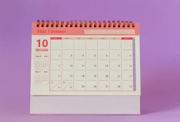 istock Hello October.Desktop calendar for October 2022 on a colored background. 1430346727