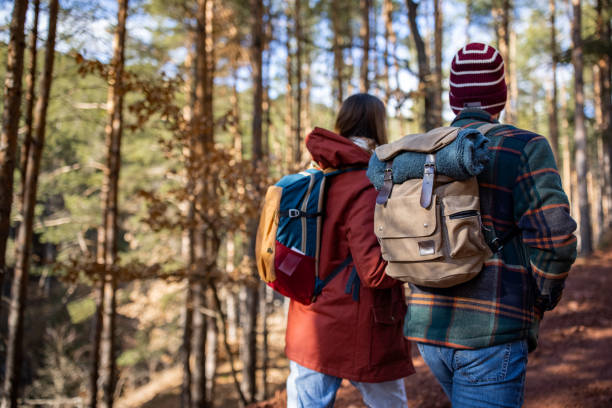 istock Young couple on a forest hiking trip 1430346874