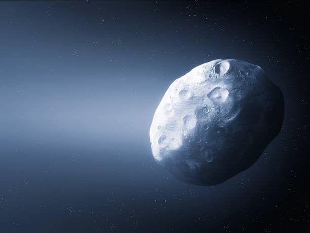 istock Surface of a glowing comet in the night sky with a bright tail. 1430351801