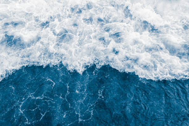 istock Dark blue sea ocean wave and  liquid white foam 1430358114