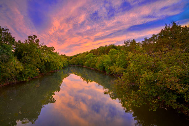 Colorful clouds from setting sun over the South Fork of the Licking River.