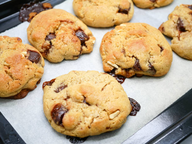 istock Fresh homemade soft chocolate chip cookies and nuts 1430361308