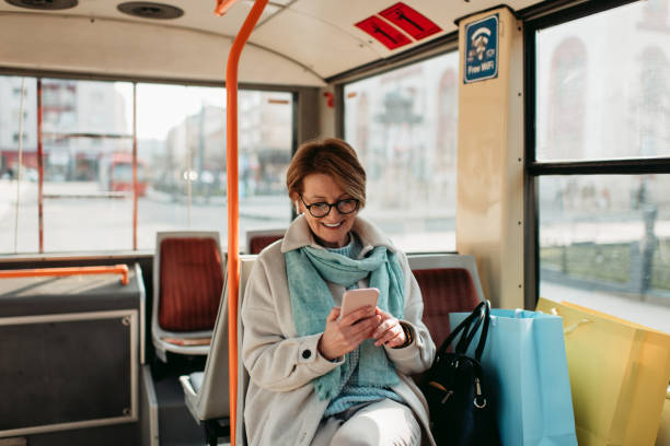 istock Senior woman in the bus 1430361686