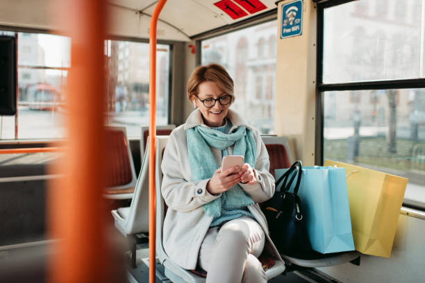 istock Senior woman in the bus 1430361859