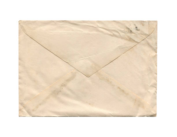 istock old vintage aged closed paper envelope isolated on white 1430363392