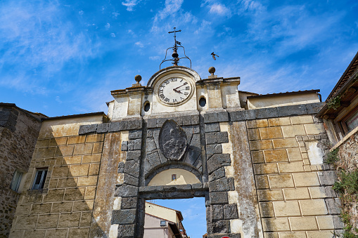 City gate with clock in Anguillara Sabazia, Lake Bracciano  Lazio Italy