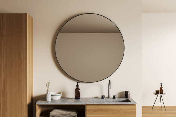 istock Light bathroom interior with sink and mirror, minimalist accessories on deck 1430372339