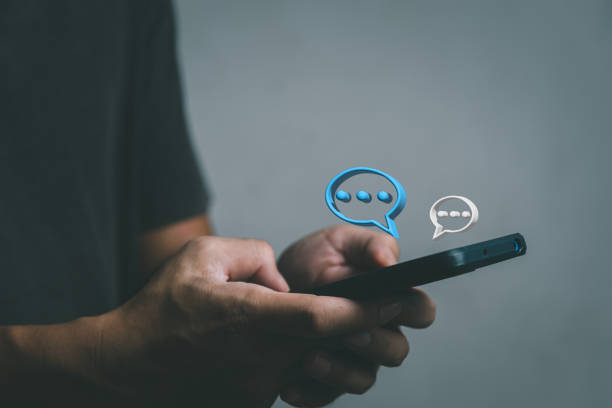 istock Man hand typing on mobile smart phone digital web chatting on application and social network icon bubble speech 3D. 1430373319
