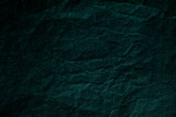 istock Smooth dark green crumpled paper background texture 1430376111