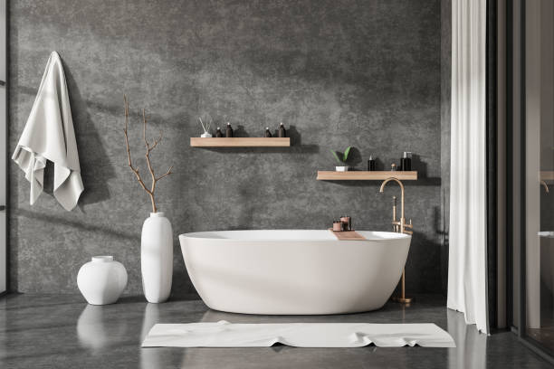 istock Front view on dark bathroom interior with bathtub, glass partition 1430376776